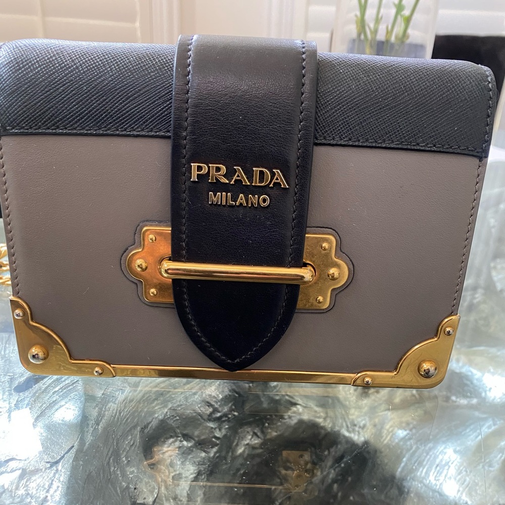 Prada cahier leather crossbody In black and /grey . Authentic . Gently used .